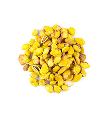 dried broad bean in spoon on white background