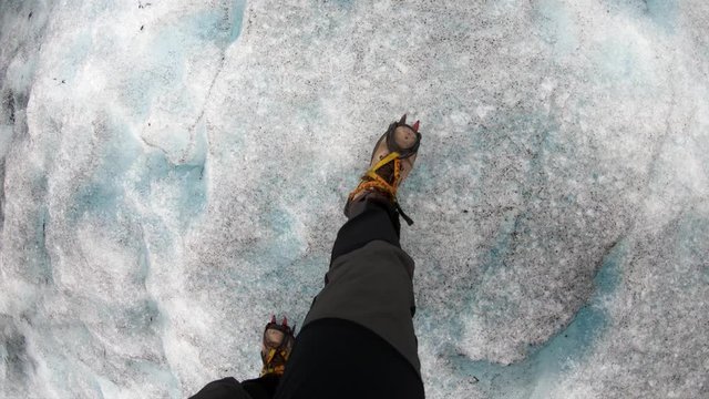 Walking on Nigardsbreen, arm of Jostedalsbreen glacier in Norway
