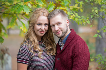 Fototapeta premium A portrait of young married couple expecting a baby