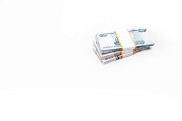 Obraz na płótnie Canvas stacks of russian money isolated on white with copy space