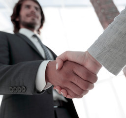 Business people shaking hands isolated on white background