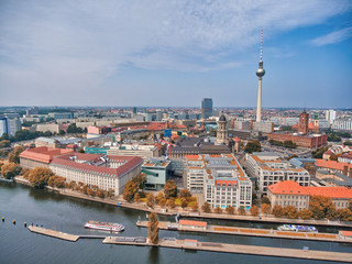 Berlin aerial view from drone, Germany. Buildings, tower and city river
