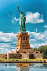 Statue of Liberty (Liberty Enlightening the world) near New York. - obrazy, fototapety, plakaty