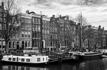 Fototapeta premium Amsterdam and boats in harbor