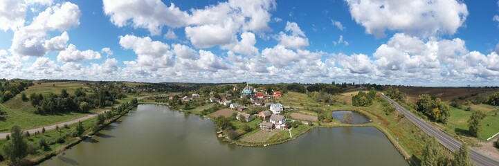 Fototapeta na wymiar Aerial panorama view of beautiful Village Landscape on a Hill