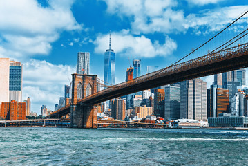 Suspended Brooklyn Bridge across Lower Manhattan and Brooklyn. New York, USA.