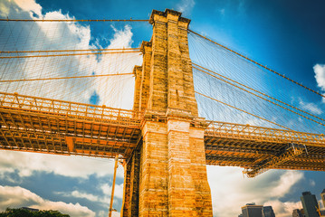 Suspended Brooklyn Bridge across Lower Manhattan and Brooklyn. New York, USA.