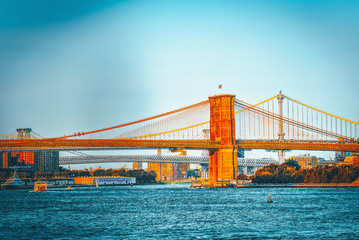 Suspended Brooklyn Bridge across Lower Manhattan and Brooklyn. New York, USA.