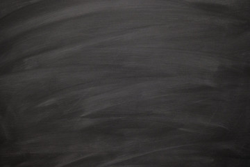 Abstract texture of chalk rubbed out on blackboard or chalkboard, concept for education, back to school, creatively, teaching , etc.