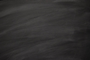 Naklejka premium Abstract texture of chalk rubbed out on blackboard or chalkboard, concept for education, back to school, creatively, teaching , etc.