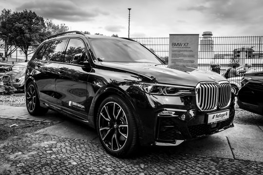 Full-size luxury SUV BMW X7 xDrive40i on May 01, 2019 in Berlin, Germany. Black and white.