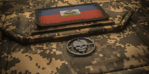 Republic of Haiti army chevron on ammunition with national flag. 3D illustration