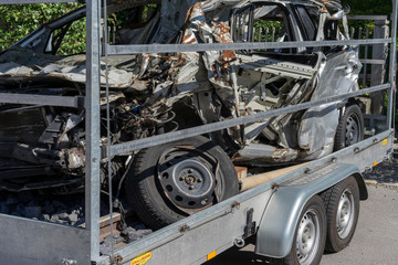 Ludwigsburg, Germany - 15 September 2019: Destroyed car on the tow truck. Total demolished car.