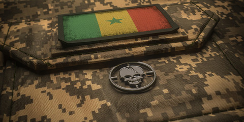 Republic of Senegal army chevron on ammunition with national flag. 3D illustration