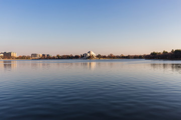 Fototapeta na wymiar Thomas Jefferson Memorial with Tidal Basin lake in front during the sunset, Washington D.C.