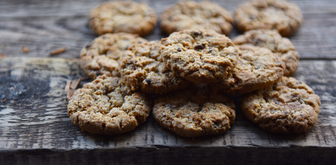 traditional chocolate chip cookies on wooden boards