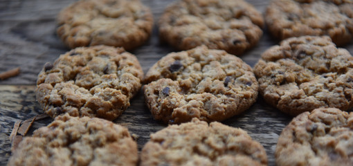 traditional chocolate chip cookies on wooden boards