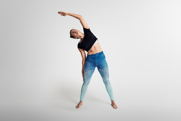inclination to the left,  yoga pose, woman on white background