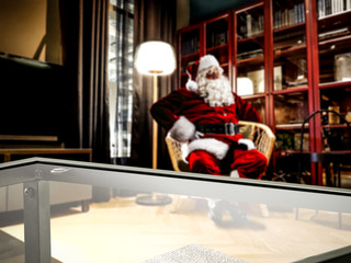 Fototapeta na wymiar Desk of free space and Santa Claus 