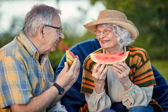 Happy Senior Couple.mature Couple Eating Watermelon.