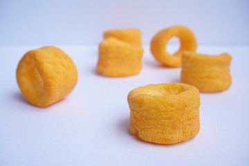cheese rings scattered on table
