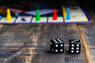 board game with black dice