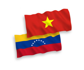 Flags of Venezuela and Vietnam on a white background