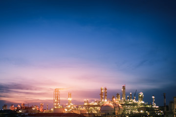 Fototapeta na wymiar Oil and gas refinery plant or petrochemical industry on sky sunset background, Factory of petroleum at twilight