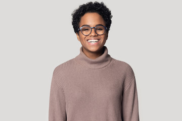 Head shot portrait smiling African American girl wearing glasses