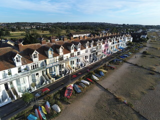 Aerial top view  at pretty terrace Houses in Whitstable, Kent, Uk, England, UK. Evening sunset...