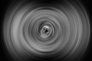 An abstract blurry black and white background image.