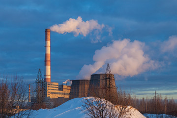 Thermal electro station with big barrels heats up the city in the winter landscape. Yoshkar-Ola...