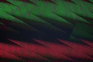 Abstract colorful parallel zigzag lines texture background, green and red neon light zig zag stripes on black backdrop, decorative bright dots ornament, geometric digital graphic pattern, copy space
