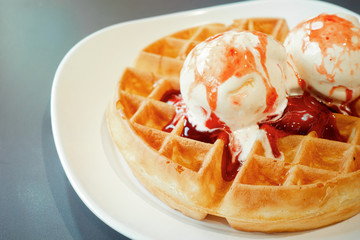 Waffle vanilla ice cream serve on a white dish