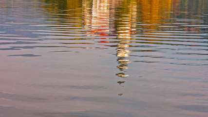 The church reflected in the water of the Blad lake