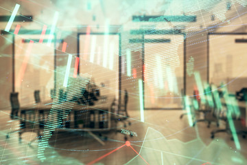 Stock and bond market graph and world map with trading desk bank office interior on background. Multi exposure. Concept of international finance