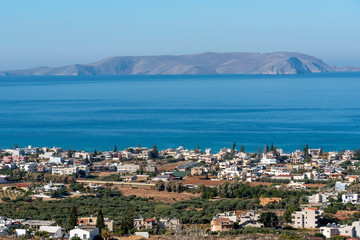 Gouves, Heraklion, Crete, Greece. October 2019. An overview of the town of Gouves towards Dia Island just of the coast and in the Sea of Crete.