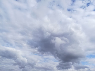 Clouds are approaching in the photo. It will rain and cold soon.