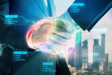 Double exposure of human brain hologram on city view background with handshake. Concept of education