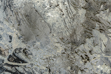 grunge surface with dirt and dust  and scratches on it, strokes of grey color texture background