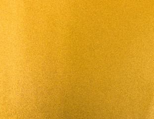 Gold foil leaf shiny wrapping paper texture background for wall paper decoration element