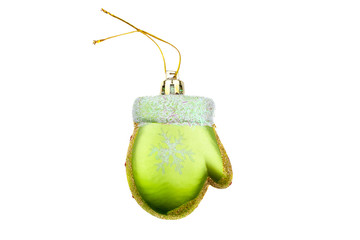 Green mitten Christmas tree ornament with painted snowflake and gold powder isolated on white background