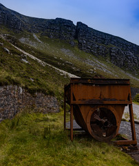 Obraz premium Old rusty mining machinery at Muckish Mountain, Gweedore, County Donegal, Ireland, 