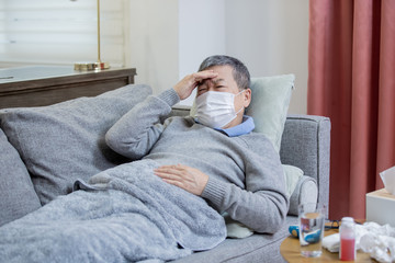 asian eldely man feel headache