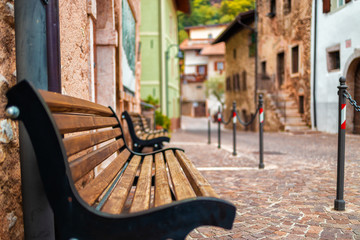 Old small stone street in Italy. City of Ranzo province of Trento. The foreground in focus, the...