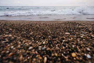 Beautiful ocean sunrise panorama. Scenic seascape. Azure water landscape with blue sky, horizon and white fluffy clouds. Sea turquoise surface. Summer vacation. Wild nature paradise background