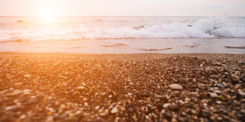 Beautiful ocean sunrise panorama. Scenic seascape. Azure water landscape with blue sky, horizon and white fluffy clouds. Sea turquoise surface. Summer vacation. Wild nature paradise background