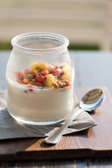 Yogurt with berries close up