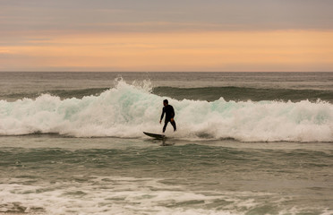 Surfer at sunset