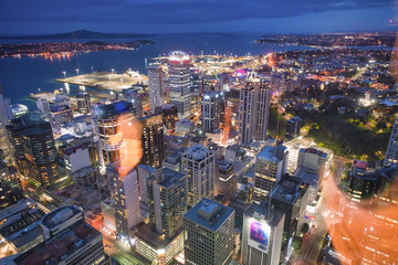Amazing aerial view of Auckland skyline at night. City buildings and skyscrapers, New Zealand
